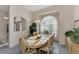Bright dining room with a large table, chairs and plenty of natural light at 139 Long Meadow Lane Ln, Rotonda West, FL 33947