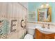 Clean bathroom with updated vanity and shower at 839 40Th St, Sarasota, FL 34234