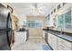 Bright kitchen with stainless steel appliances and granite countertops at 839 40Th St, Sarasota, FL 34234