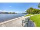 Peaceful waterfront park with benches overlooking the calm water at 839 40Th St, Sarasota, FL 34234