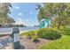 Scenic waterfront walkway with a unique mermaid sculpture at 839 40Th St, Sarasota, FL 34234