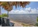 Scenic waterfront view with bench, offering tranquil waterfront living at 839 40Th St, Sarasota, FL 34234