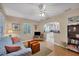 Open concept living room with a view into the kitchen at 839 40Th St, Sarasota, FL 34234