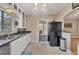 Modern kitchen featuring granite countertops and ample cabinet space at 839 40Th St, Sarasota, FL 34234
