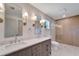 Modern bathroom with double vanity and large walk-in shower at 221 Evergreen St, Punta Gorda, FL 33982