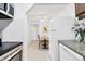Bright kitchen with granite countertops and modern appliances at 3245 Beneva Rd # 104, Sarasota, FL 34232