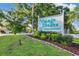 Village Brooke Condominiums entrance sign with landscaping at 3245 Beneva Rd # 104, Sarasota, FL 34232