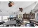 Community room features a pool table, seating areas, and a library at 3245 Beneva Rd # 104, Sarasota, FL 34232