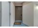 Simple entryway with brown door and welcome mat at 4113 Putter Pl, Bradenton, FL 34203