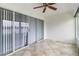Sunroom with tiled floor and sliding glass doors at 4113 Putter Pl, Bradenton, FL 34203