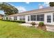 House exterior showcasing landscaping and patio at 4113 Putter Pl, Bradenton, FL 34203