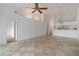 Spacious living room featuring tile floors and ceiling fan at 4113 Putter Pl, Bradenton, FL 34203