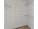 Walk-in closet with wire shelving and shoe rack at 4113 Putter Pl, Bradenton, FL 34203