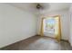 Bedroom with window and neutral carpeting at 4113 Putter Pl, Bradenton, FL 34203