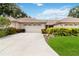 House with attached two car garage and landscaped yard at 4113 Putter Pl, Bradenton, FL 34203