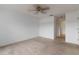 Bedroom featuring neutral carpeting and a ceiling fan at 4113 Putter Pl, Bradenton, FL 34203
