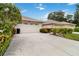 House with attached two car garage and landscaped yard at 4113 Putter Pl, Bradenton, FL 34203
