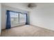 Bright bedroom with window and neutral carpeting at 4113 Putter Pl, Bradenton, FL 34203