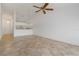 Bright living room with tile floors and high ceilings at 4113 Putter Pl, Bradenton, FL 34203