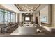 Relaxing lounge area with comfortable seating and fireplace at 555 Quay Cmn # 803, Sarasota, FL 34236