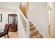 Staircase with white railing and carpeted steps at 341 Cape Harbour Loop # 105, Bradenton, FL 34212