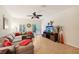 Living room with sectional sofa and sliding glass doors at 341 Cape Harbour Loop # 105, Bradenton, FL 34212