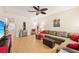 Living room with sectional sofa and access to backyard at 341 Cape Harbour Loop # 105, Bradenton, FL 34212