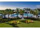 Relaxing pool area with colorful Adirondack chairs at 10112 Cross River Trl, Parrish, FL 34219