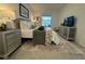 Well-appointed bedroom featuring a plush rug, comfortable bed, and modern furnishings at 17445 Opal Sand Dr # 104, Venice, FL 34293
