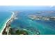 Expansive aerial view of the coastline, showcasing the waterways and stunning ocean views at 5111 Coral Blvd, Bradenton, FL 34210