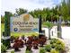 Entrance sign to Coquina Beach North Entrance, showcasing its natural beauty at 5111 Coral Blvd, Bradenton, FL 34210