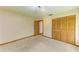 Bedroom with closet and door leading to a hallway at 5111 Coral Blvd, Bradenton, FL 34210