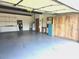 Spacious garage with ample storage cabinets, water heater, and room for parking at 5111 Coral Blvd, Bradenton, FL 34210