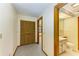 Hallway with access to a bathroom and closet at 5111 Coral Blvd, Bradenton, FL 34210