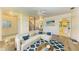 Bright living room with sleek hardwood floors and staircase at 5111 Coral Blvd, Bradenton, FL 34210
