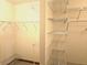 Walk-in closet with multiple shelves at 5111 Coral Blvd, Bradenton, FL 34210