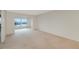 Bright bedroom with water views and carpet flooring at 12405 3Rd E St # 206, Treasure Island, FL 33706