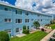 Building exterior view, showcasing waterfront location at 12405 3Rd E St # 206, Treasure Island, FL 33706