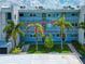 Exterior view of condo building, highlighting a specific unit at 12405 3Rd E St # 206, Treasure Island, FL 33706