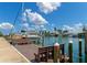 Community dock with benches and boat slips at 12405 3Rd E St # 206, Treasure Island, FL 33706
