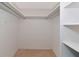 Spacious closet with hanging rod and shelving at 12405 3Rd E St # 206, Treasure Island, FL 33706
