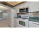 Kitchen features stainless steel appliances and green countertops at 12405 3Rd E St # 206, Treasure Island, FL 33706