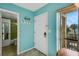 Bright condo entryway with access to bathroom and living space at 845 Benjamin Franklin Dr # 202, Sarasota, FL 34236