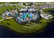 Aerial view of community pool, playground and clubhouse at 10145 Spruce River Way, Parrish, FL 34219