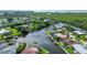 Aerial view of canal front home with private pool and lush landscaping at 5319 Bimini Dr, Bradenton, FL 34210