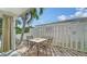 Small patio with table and chairs, perfect for enjoying morning coffee at 5319 Bimini Dr, Bradenton, FL 34210