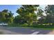 Residential lot with a view of a neighboring home and trees at 12004 Big Bend Rd, Riverview, FL 33579