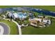 Resort-style community pool, playground, and walking paths at 11671 Great Brook Ln, Parrish, FL 34219