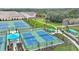 Outdoor tennis and pickleball courts with shade structures at 6227 Dry Tortugas Dr, Sarasota, FL 34241