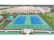 Two well-maintained tennis courts at 6227 Dry Tortugas Dr, Sarasota, FL 34241